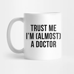 Trust me I'm (almost) a doctor. In black. Mug